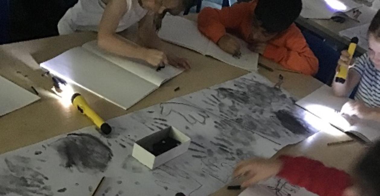 Pupil working with charcoal